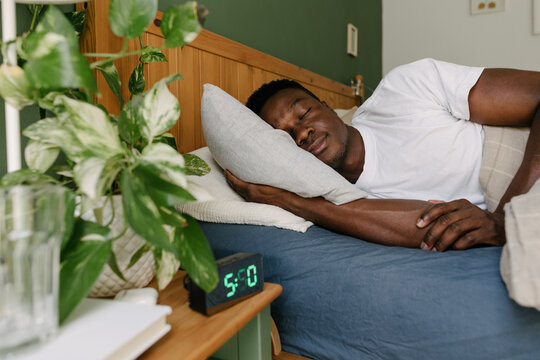 A sleeping man in the bed