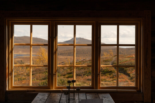 Fototapeta Window cabin in the mountain