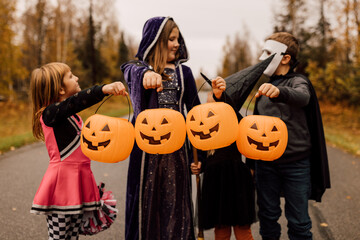 Kids Trick or Treating In Halloween Costumes