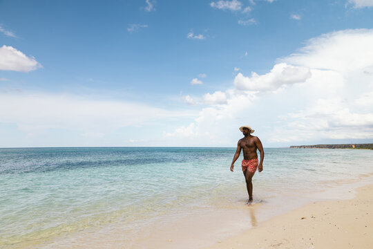 Man enjoying a day at the beach in the Caribbean Sea.