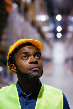 Black warehouse worker. Service stewardship portrait occupation