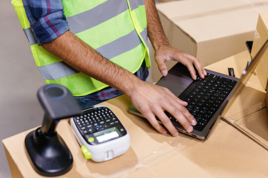 Anonymous warehouse employee working in distribution center