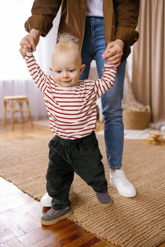First step walking support developmental milestone practice encourage 