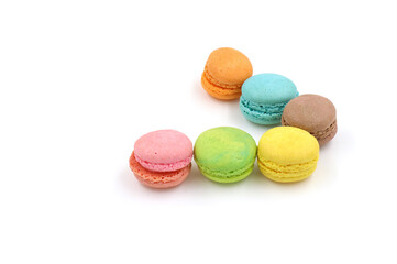 Sweet colorful macarons isolated on white background. Tasty colourful macaroons.