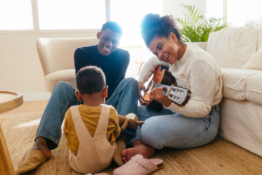 Happy family spending time together at home