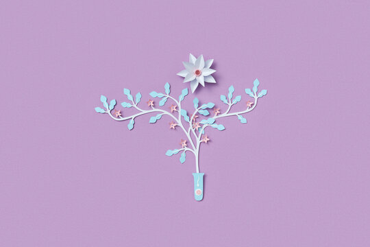 Papercraft composition of test tube with female egg and male sperm