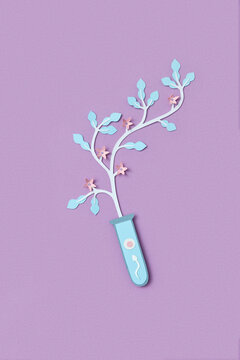 Paper made test tube with spermatozoa penetrating into female egg