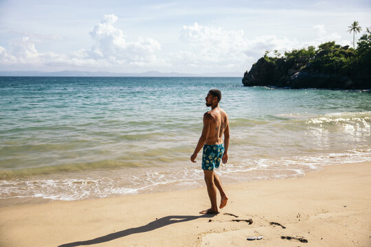 Man enjoying a day at the beach in the Caribbean Sea.