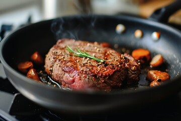 Looking into a frying pan while searing a steak.