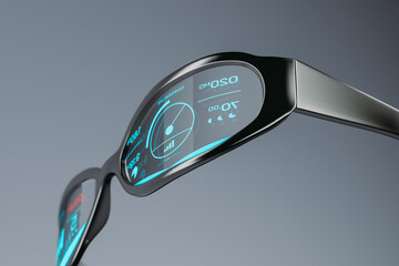 A futuristic glasses device with a digital display on