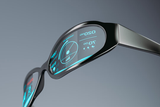 A futuristic glasses device with a digital display on