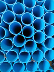 Close up to blue plastic pipe background