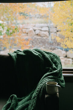 mug left on armchair