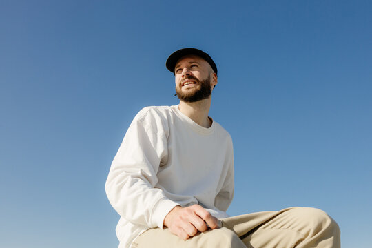 Portrait of a man against the sky
