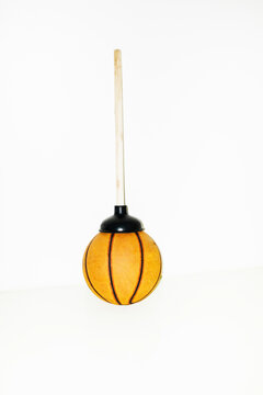 Suction cup / plunger and basketball with hard direct flash
