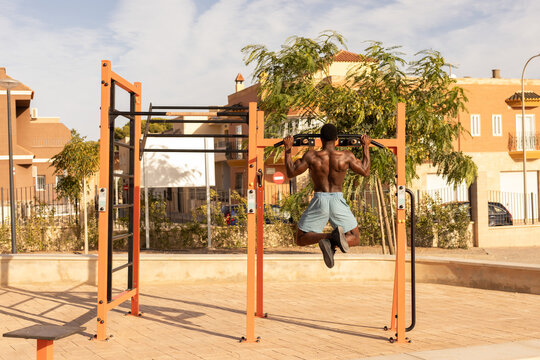 young man doing calisthenics