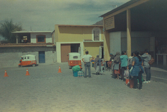 FILM morning crowd waiting for a ride at the market