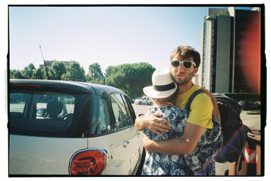 Son hugging his mother goodbye