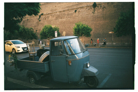 Rome streets with typical vehicle