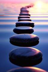 Obraz premium Tranquil zen stones resting in calm waters, reflecting the serene beauty of the sunset