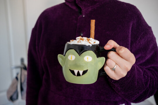 Pumpkin spice latte in a Dracula Halloween mug