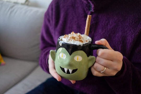 Pumpkin spice latte in a Dracula Halloween mug
