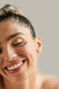 Woman with makeup on her face