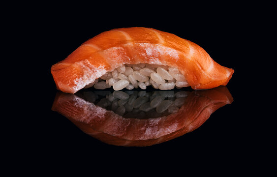 Delicious sushi nigiri with smoked salmon on rice