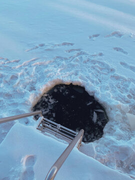 The font in the pond in winter.