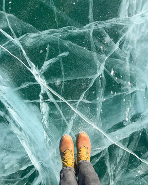 Legs with Ice pattern of the frozen lake