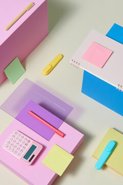 colorful office and school stationery on beige background