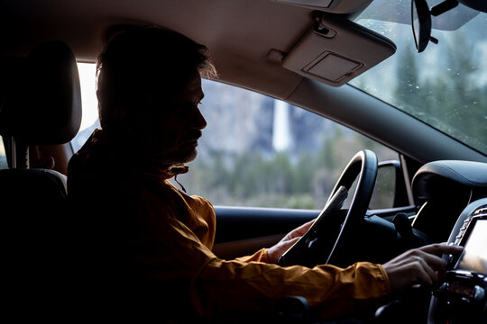 A Man Driving through Yosemite