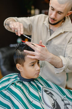 child's haircut at the barbershop