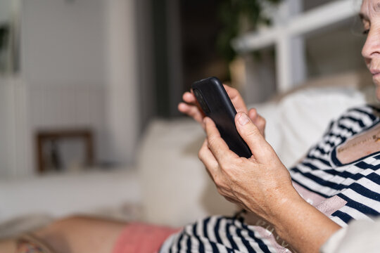 Woman using mobile phone.