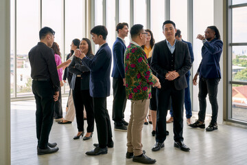 Group of diverse businesspeople are talking and communicating together in business meeting room.