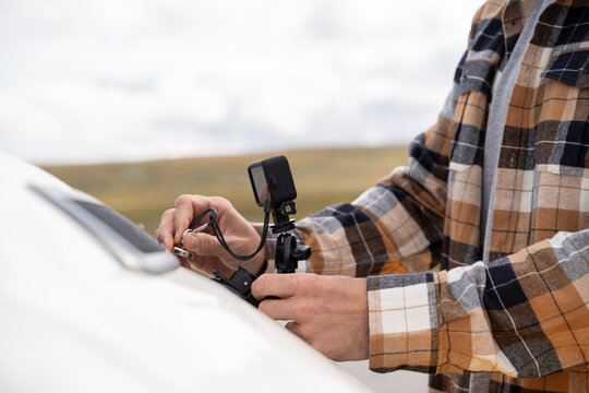 Man action camera on car
