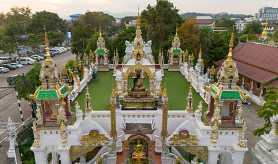 Aerial view of Wat Ming Mueang temple the most tourist attraction places in the downtown of Chiang Rai province of Thailand.