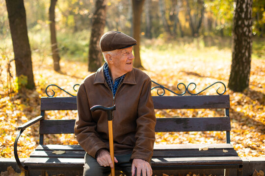 Portrait of a senior man on a bench