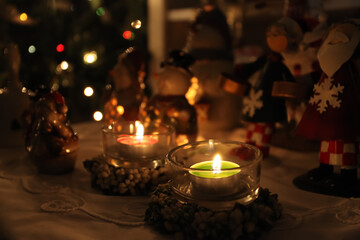 a candle on Christmas night