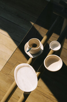 Small dishes and serving bowls in morning light