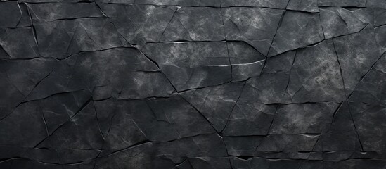 Aged textured backdrop: Black weathered surface pattern