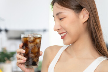 close up woman drinking soft drink cola