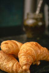 croissants (which are invoices like a croissant) and a hot drink such as coffee, tea or mate (traditional from Argentina), which can be used for marketing, posters or menus.