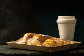 croissants (which are invoices like a croissant) and a hot drink such as coffee, tea or mate (traditional from Argentina), which can be used for marketing, posters or menus.