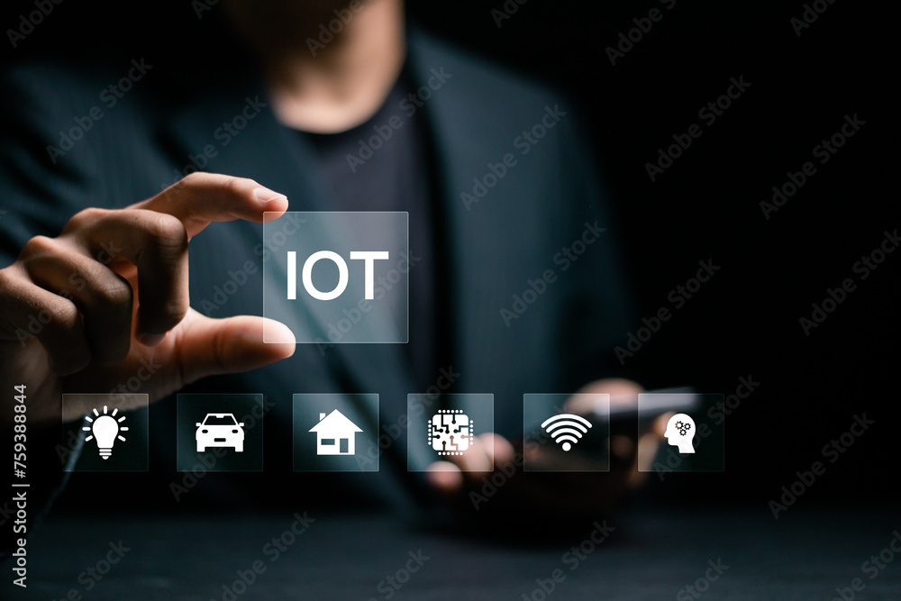 Poster smart business iot, internet of things concept. businessman touching iot icon on virtual screen for 