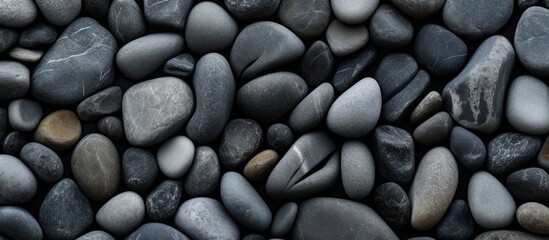 Fototapeta na wymiar Texture of rocks arranged in a natural grey pattern.