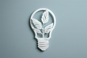 white light bulb with leaf concept on a grey background