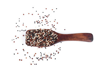 raw mix quinoa (white quinoa,black quinoa,red quinoa) on wooden bowl isolated over white background