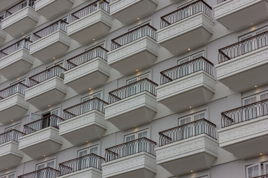Balconies in a hotel with one window is opened