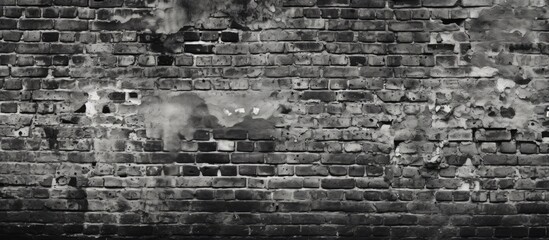 Texture of ancient brick wall with black and white filter.